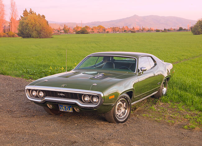 1971 Plymouth GTX Green 3/4 Front View On Dirt By Grass