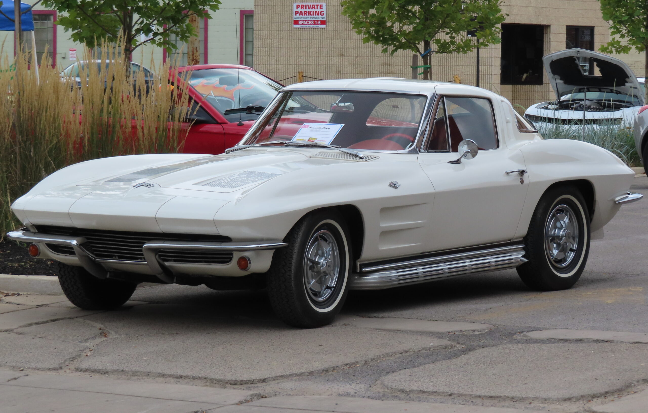 1963 Corvette Sting Ray split-window in metallic blue, sharp fenders and hidden headlamps
