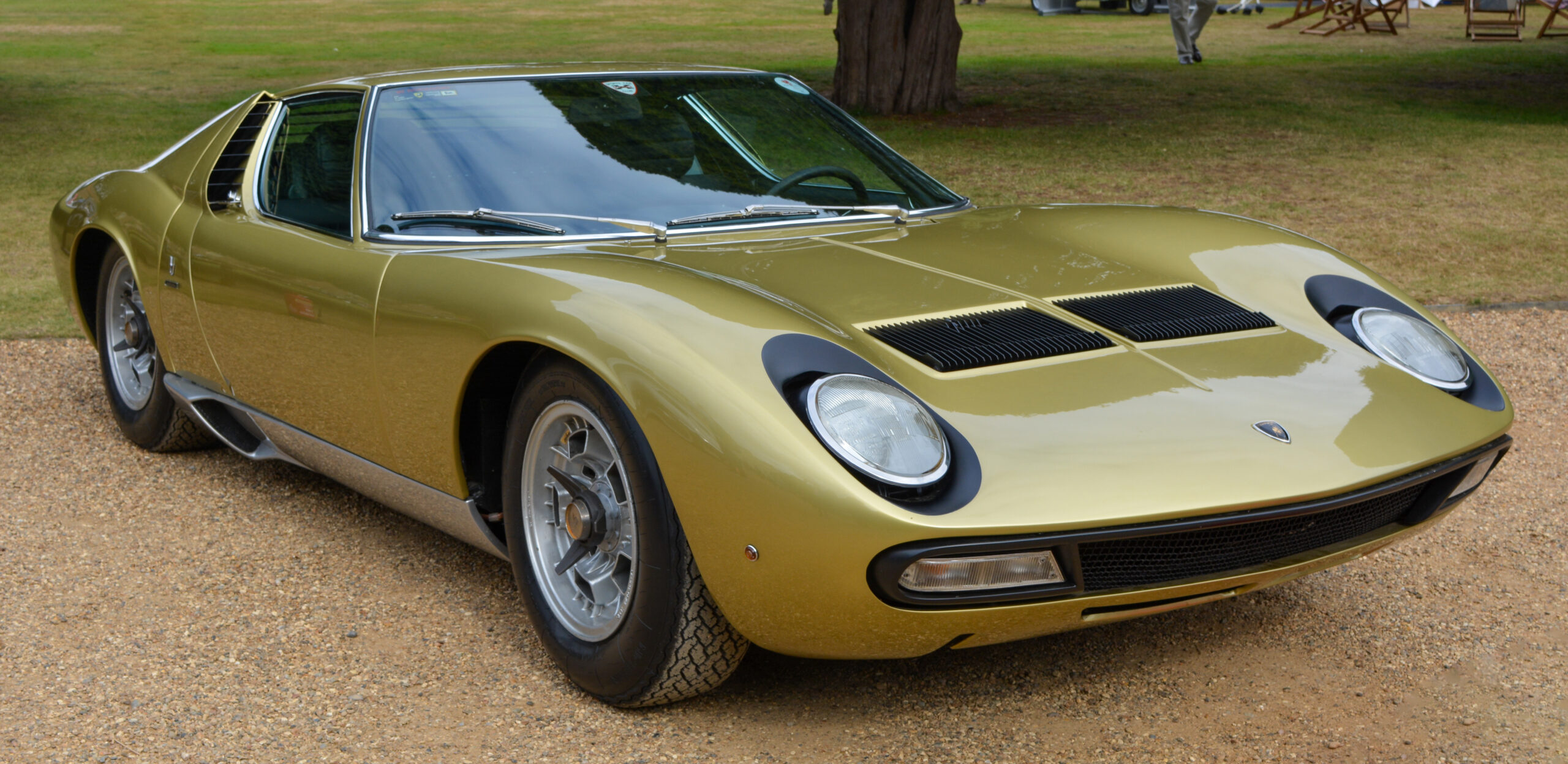 1966 Lamborghini Miura in lime green front three-quarter with eyelash headlights