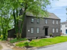 Explore The John Chase House at 505 Main St in West Newbury, MA. A historic 1699 Colonial featuring 3 beds, wide pine floors, Viking kitchen, and new septic.