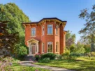 Explore The Queen Ann Home at 55 Queen Street in Belleville. A stately 1880 Victorian featuring 4 beds, historic details, and views of Corby Rose Garden.